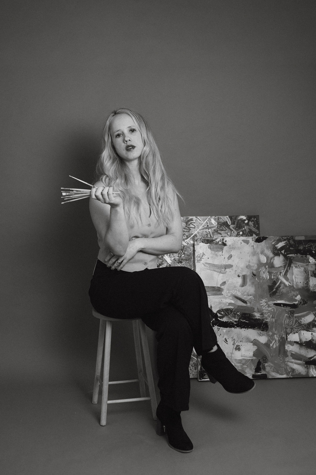 Kiri with paintbrushes, black and white